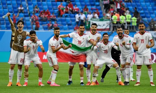 Iran's players celebrate at the end of the Russia 2018 World Cup Group B football match between Morocco and Iran at the Saint Petersburg Stadium in Saint Petersburg on June 15, 2018. (Photo by CHRISTOPHE SIMON / AFP) / RESTRICTED TO EDITORIAL USE - NO MOBILE PUSH ALERTS/DOWNLOADS        (Photo credit should read CHRISTOPHE SIMON/AFP/Getty Images)
