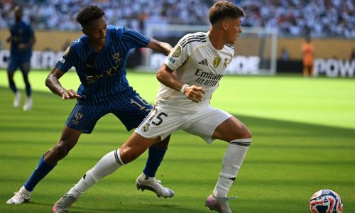 Al Hilal's Saudi midfielder #16 Nasser Al-Dawsari (L) fights for the ball with Real Madrid's Turkish midfielder #15 Arda Guler (R) during the FIFA Club World Cup 2025 Group H football match between Spain's Real Madrid and Saudi's Al-Hilal at the Hard Rock stadium in Miami on June 18, 2025. (Photo by Chandan Khanna / AFP)